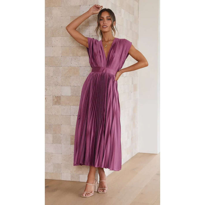 Summer V Neck Pleated Sleeveless Maxi Dress displayed on a model, featuring a pleated design in a vibrant purple color.