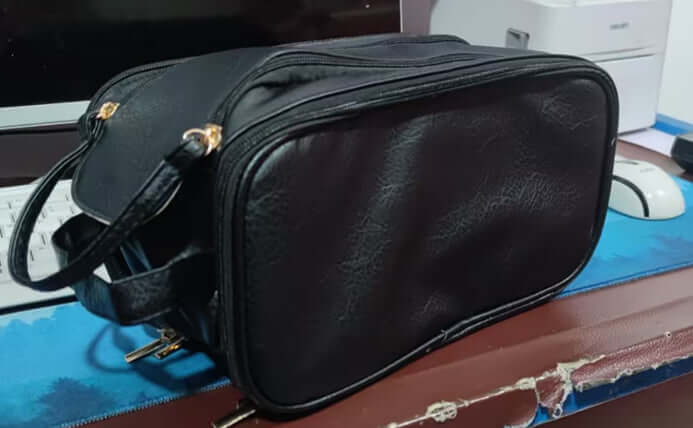 Three-layer Double Zipper U-shaped Design Cosmetic Bag expandable storage feature.