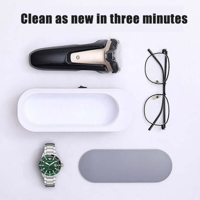 Ultrasonic High Frequency Jewelry and Glasses Cleaner with glasses, watch, and a shaver, showcasing cleaning efficiency.