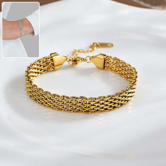 Women Chain Bracelet Golden Silver Metal Jewelry displayed on a plate, showcasing its elegant design and shiny finish.