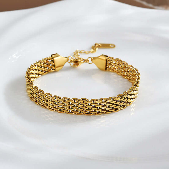 Women Chain Bracelet Golden Silver Metal Jewelry displayed on a white plate, featuring a shiny gold design.