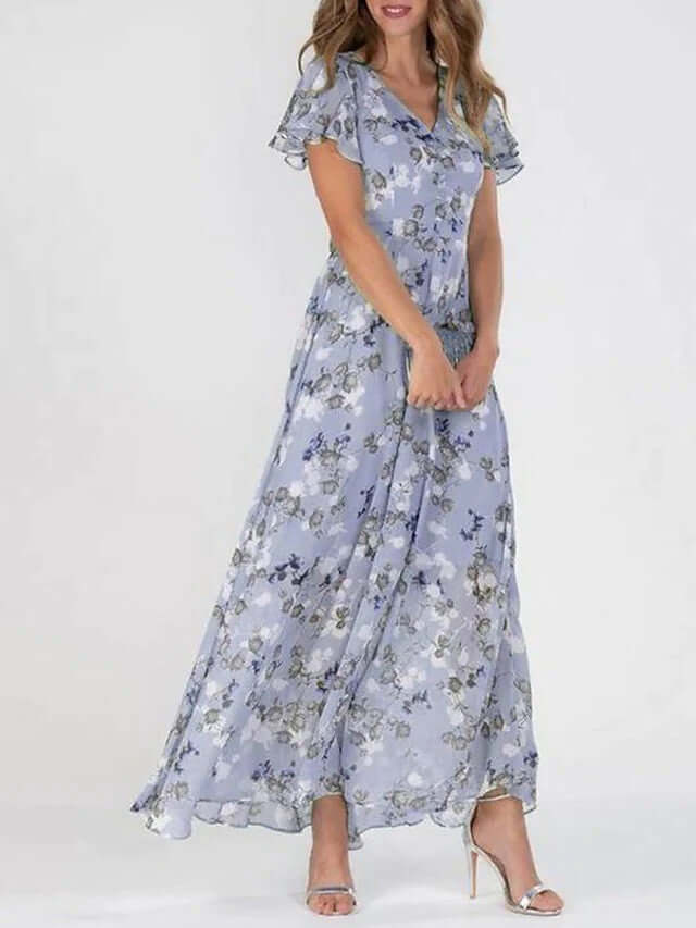 Women Floral Short Sleeve V Neck Beach Maxi Dress in light blue with floral pattern and flowy design.