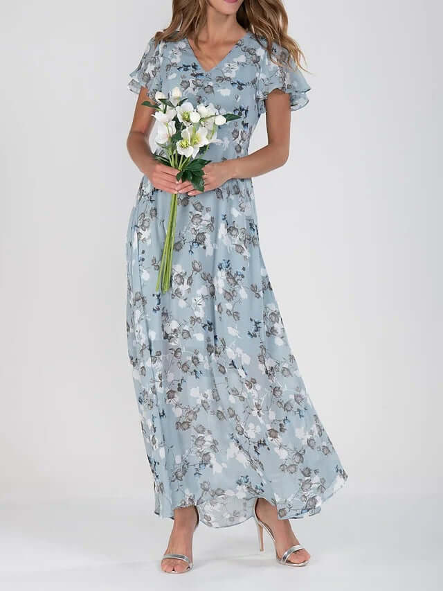 Women Floral Short Sleeve V Neck Beach Maxi Dress worn by a model holding flowers in a light blue color.