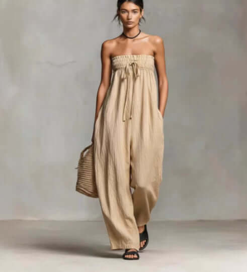 Women Strapless Ruched Jumpsuit Summer Fashion in beige, featuring a relaxed fit and pockets.