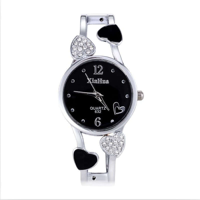 Women's British Diamond Watch with heart accents and black dial, elegant quartz timepiece.