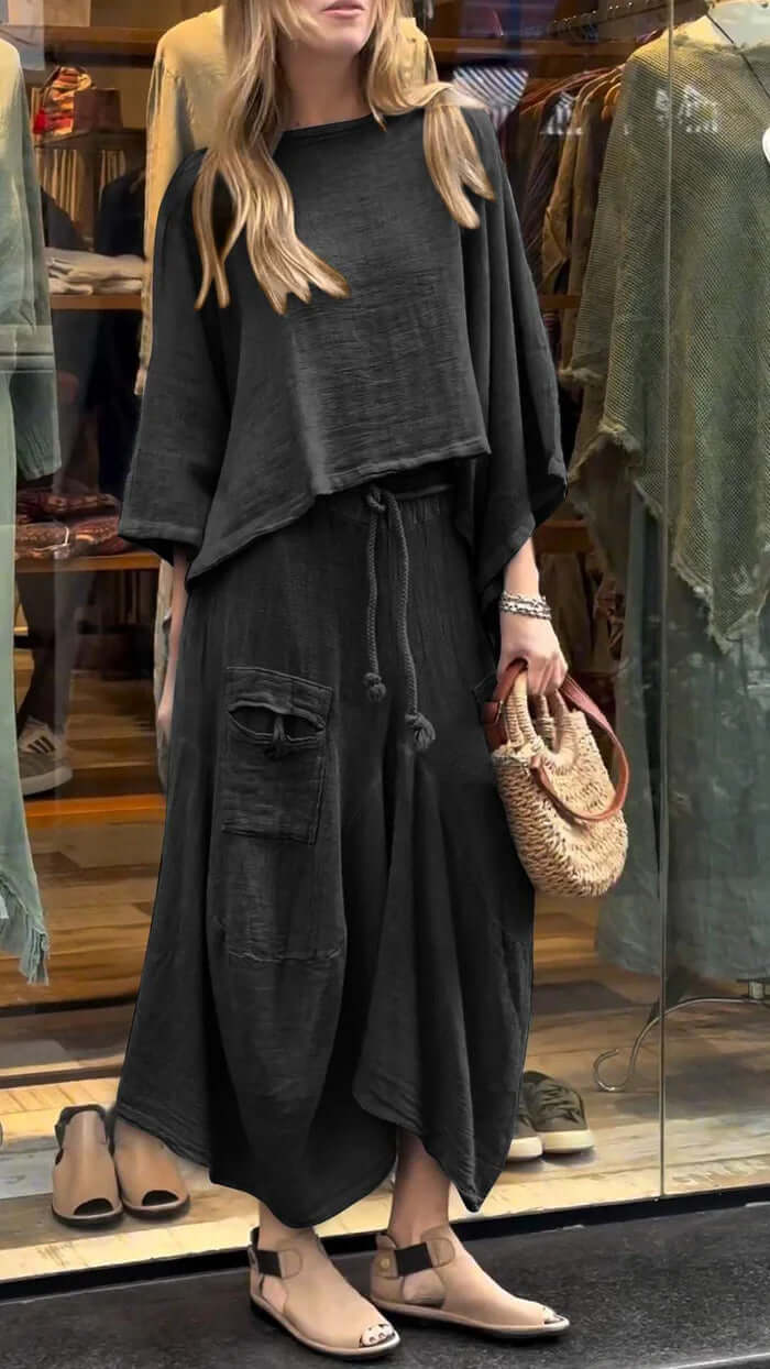 Womens Casual Loose Long Sleeve Top And Skirt Set in black style, featuring flowing fabric and a relaxed fit, perfect for daily wear.