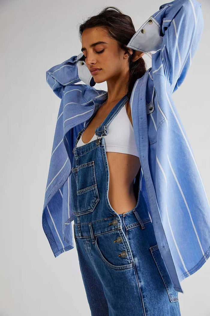 Model wearing Womens High Waisted Jumpsuit Overalls With Pockets styled with a striped blue shirt.