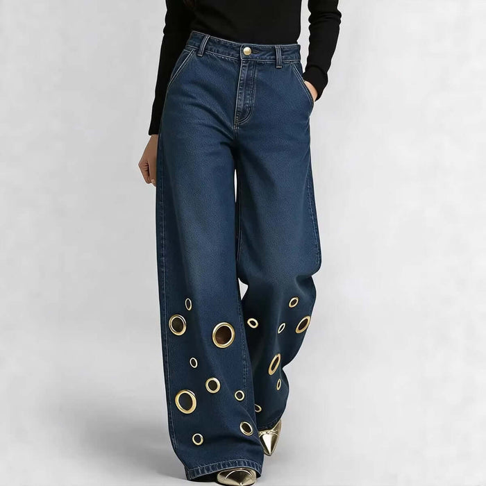 Womens High-waisted Loose-fit Denim Jeans With Cutout Design, featuring a stylish wide-leg style and unique gold cutouts.