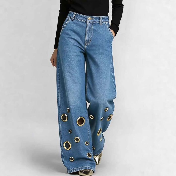 Womens High-waisted Loose-fit Denim Jeans With Cutout Design in blue with circular cutouts on the pant legs.