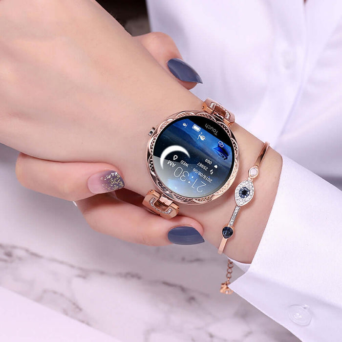 Womens Waterproof Fashion Smartwatch on wrist displaying health monitor features with stylish gold design and bracelet.