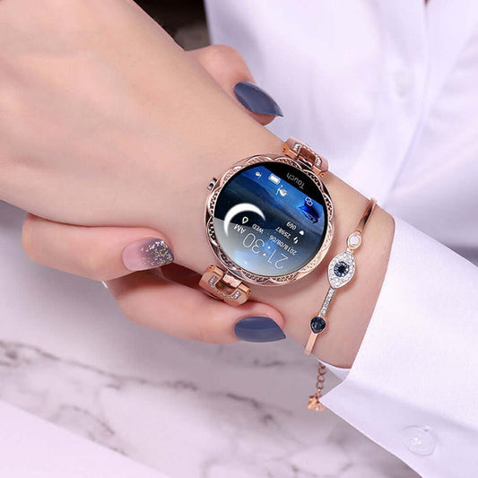 Womens Waterproof Fashion Smartwatch on wrist displaying health monitor features with stylish gold design and bracelet.