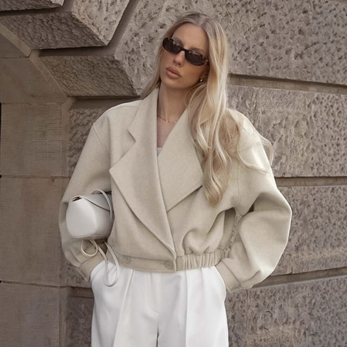 Womens Wool Blend Blazer Coat featured in stylish setting, showcasing modern commuter fashion with elegant warmth.