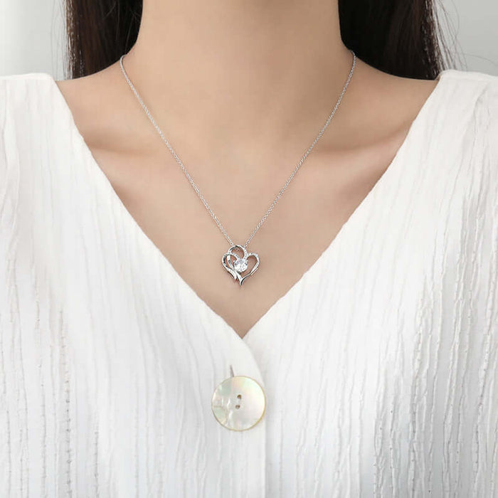 Zircon Double Love Heart Necklace Rhinestone Jewelry worn on a model in a white top.